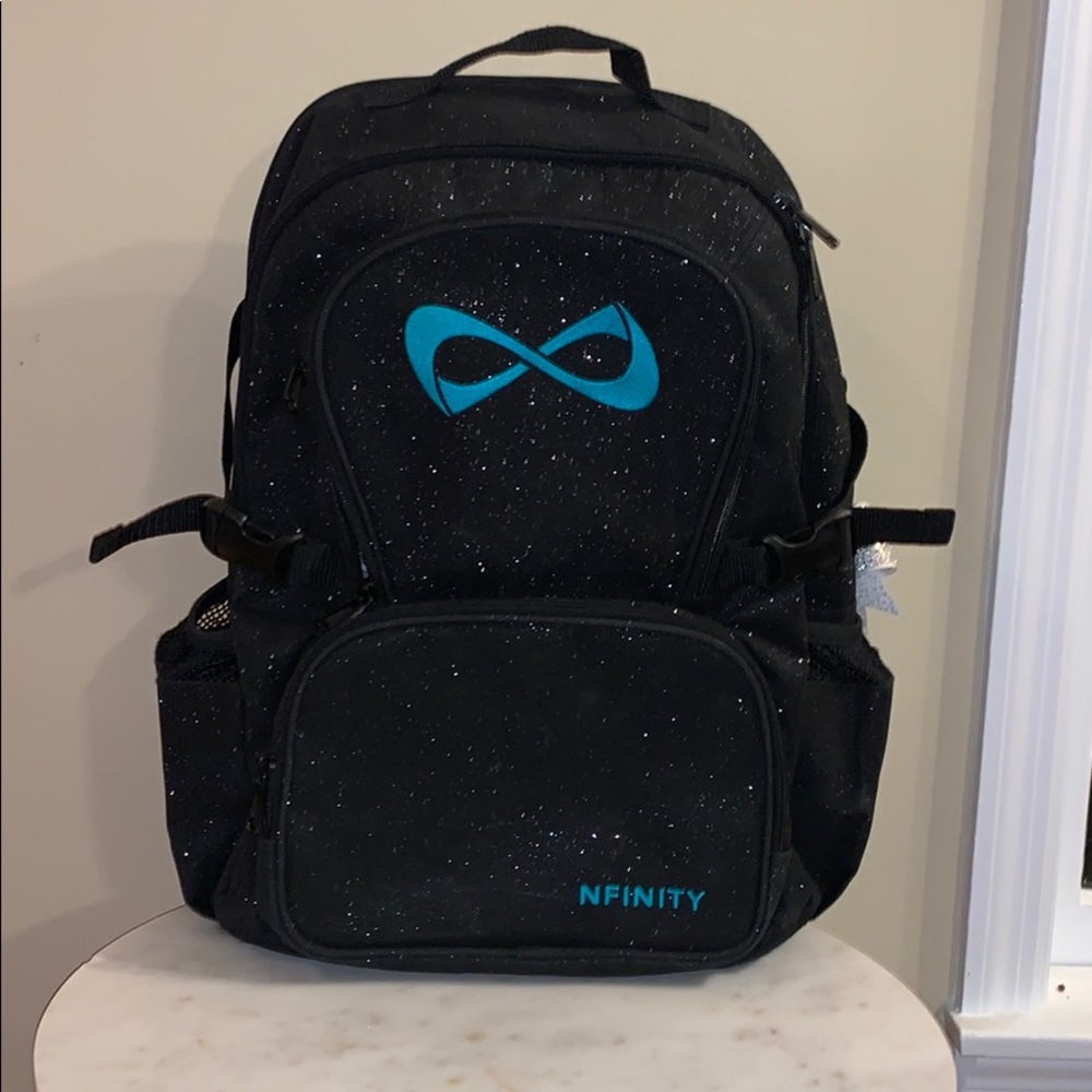 New nfinity black and teal cheer backpack